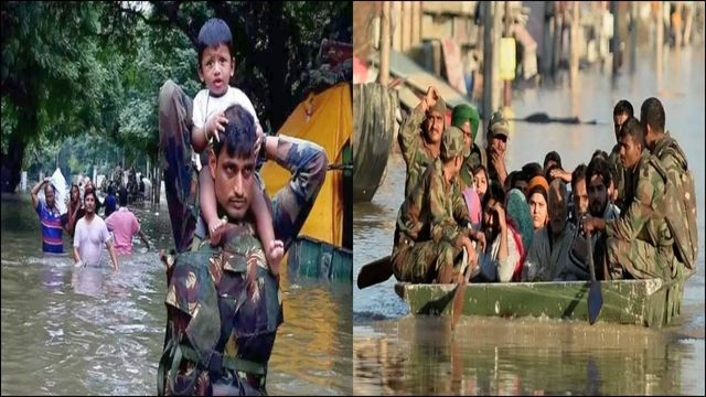 Indian Army during floods evacuating citizens to safety.